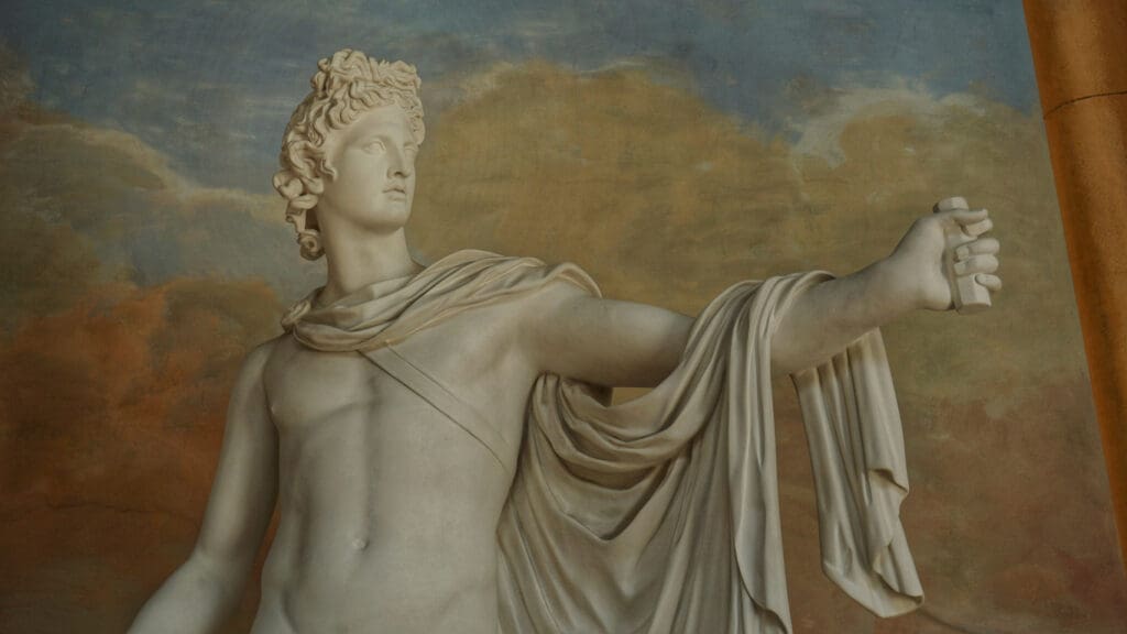 Classical white marble sculpture of mythological figure with detailed drapery, showcasing traditional marble bust sculpture from ancient Greece and Rome.