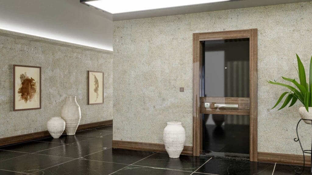 Modern hallway with marble floors, beige textured walls, potted white vases, framed abstract art, a wooden door with glass panel, and a green plant on a metal stand.